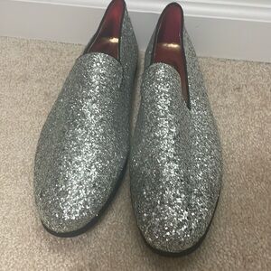 Men’s lightly worn silver sequence slip on